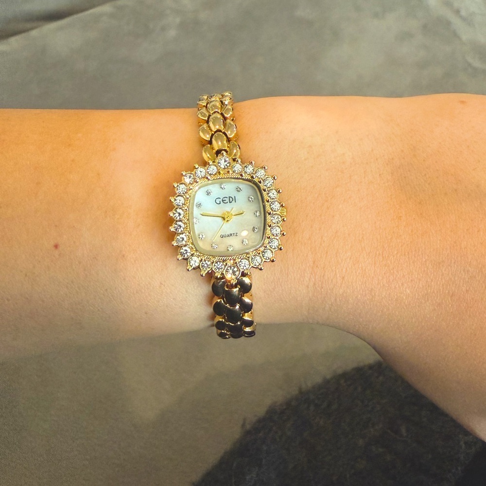 Gold-toned vintage-style watch photographed for a marketplace listing